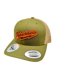 Green trucker cap with leather logo on a white background