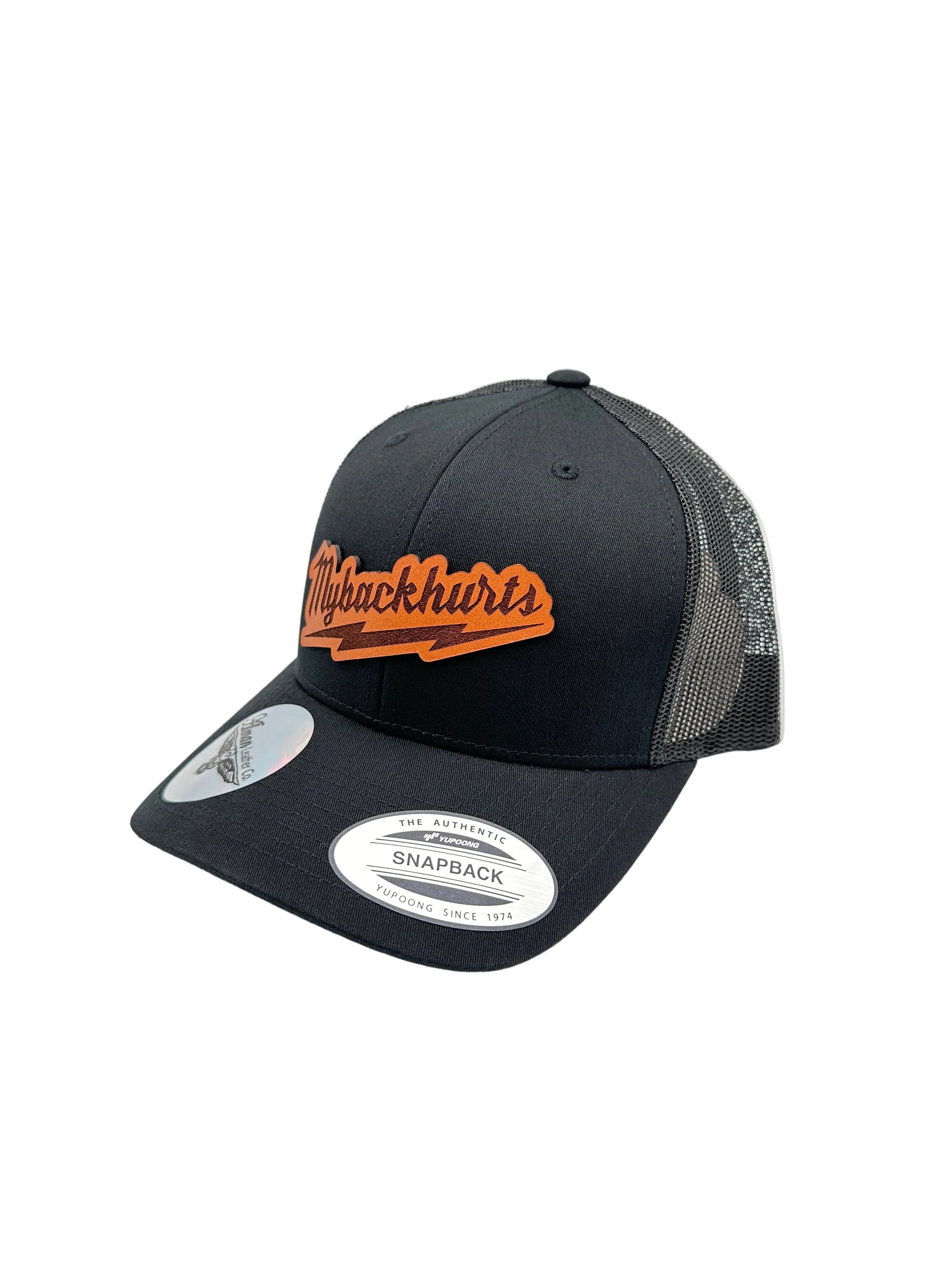 Black cap with orange logo on a white background