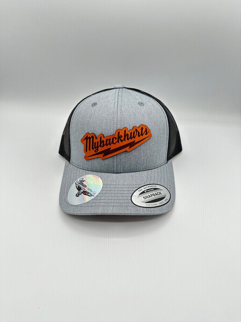 My Back Hurts" Premium Trucker Hat | Alman Leather Co.