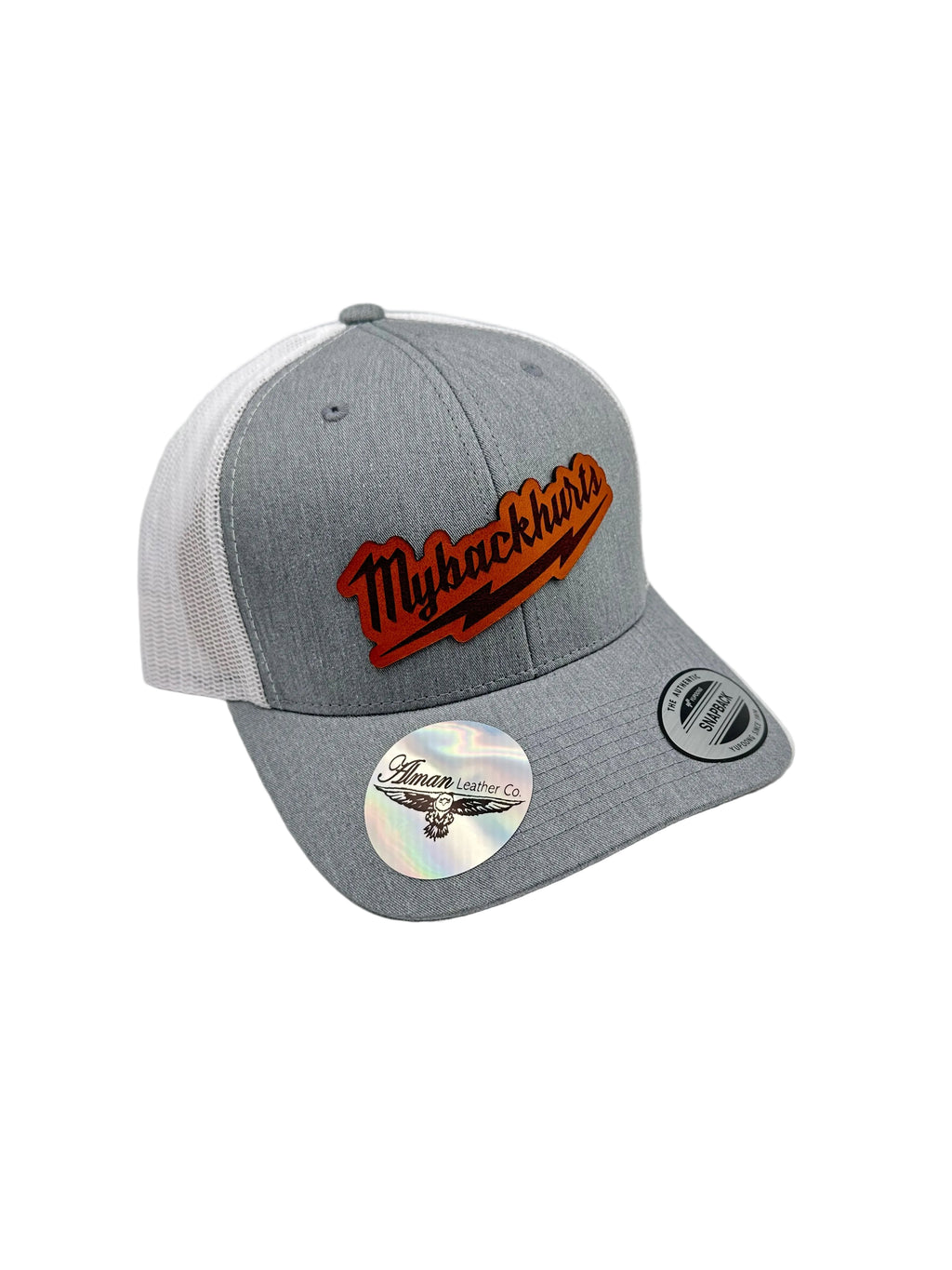 Gray cap with embroidered logo and mountain design on a light gray background